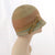 V988 Vintage: Schiaparelli, green/brown braid cloche, 22"